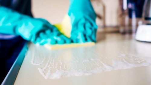 Professional carpet cleaner using equipment for One Off Cleaning